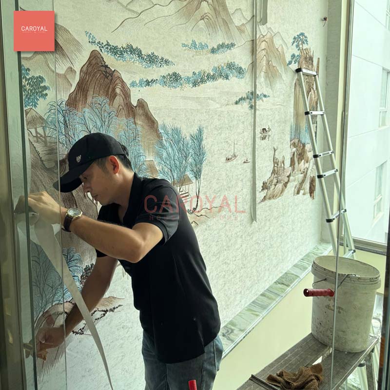 Dán tranh thêu vải tại Villa quận 8 - CAROYAL